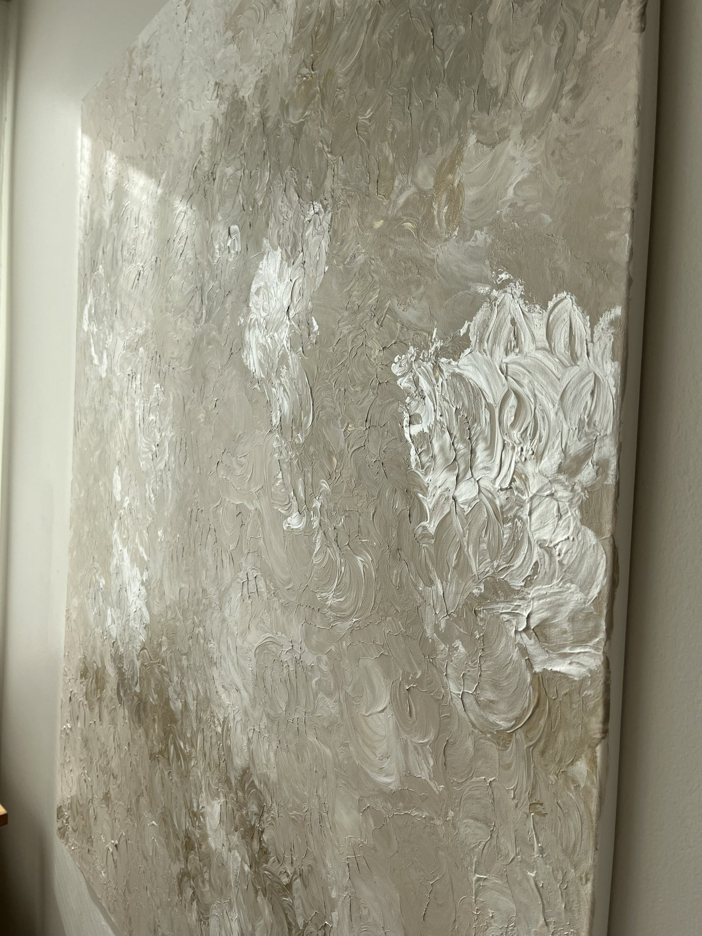Abstract painting with textured brushstrokes on a neutral background