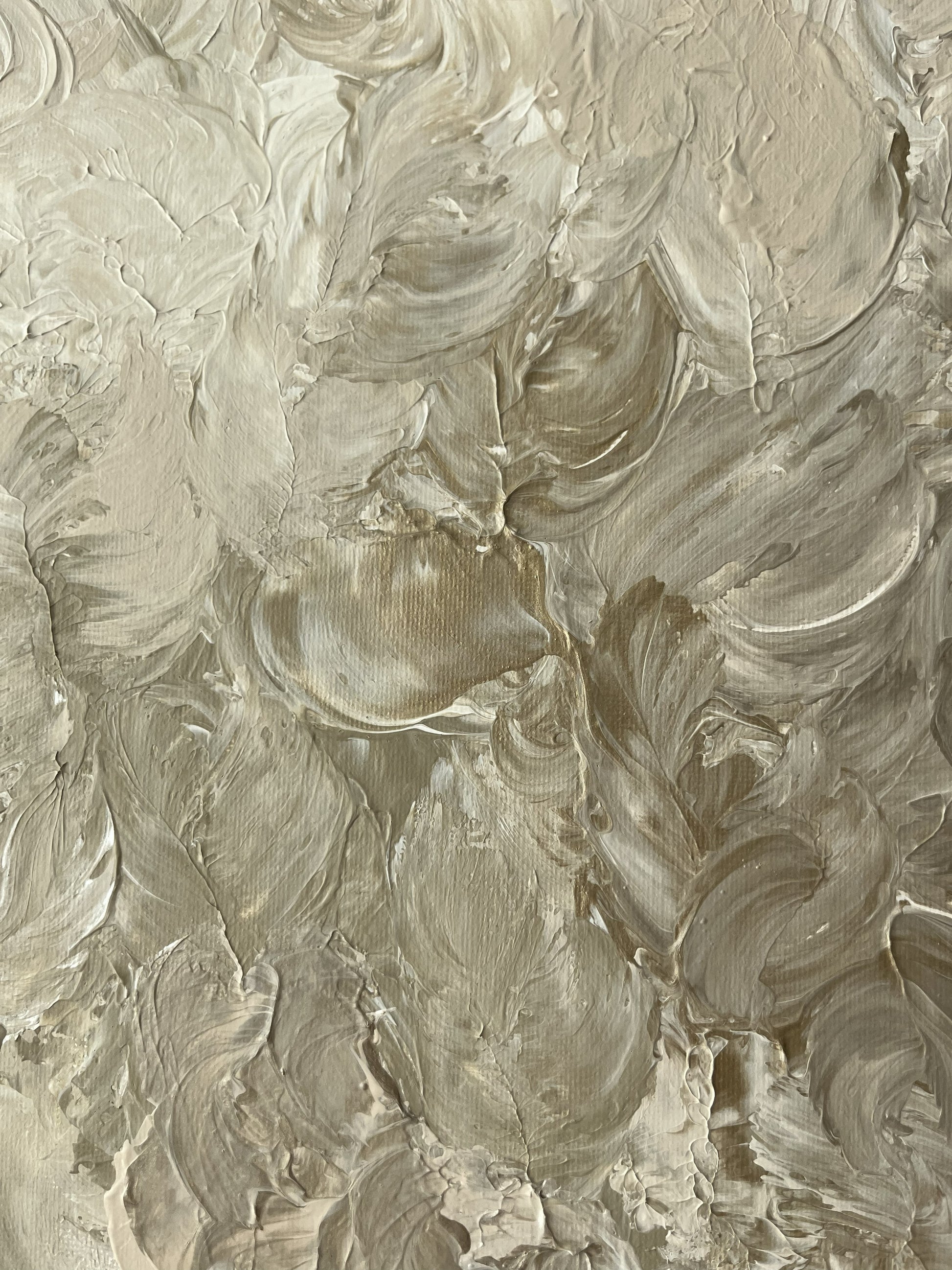 Textured beige surface with artistic brush strokes